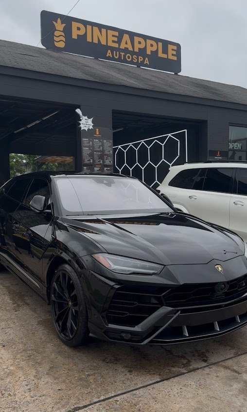 Lamborghini Urus with tinted windows at Pineapple Autospa, Houston